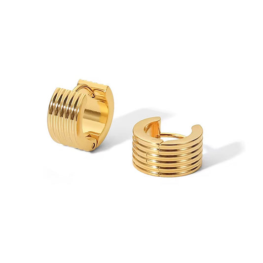 Pair of gold hoop earrings on a white background